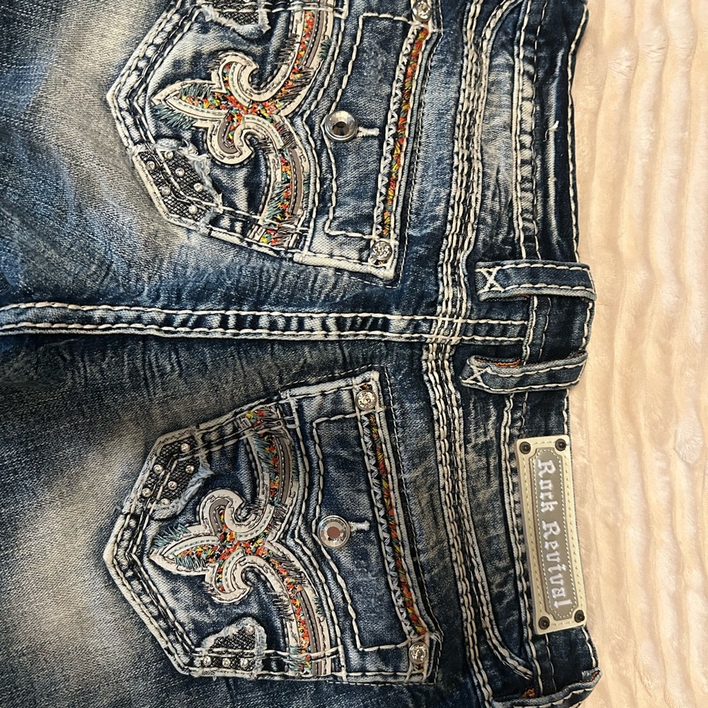 Rock Revival Indigo Denim Jeans with Embroidered Pockets